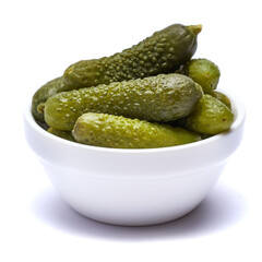 Wall Mural - Bowl of Tasty canned Whole green cornichons isolated on a white background