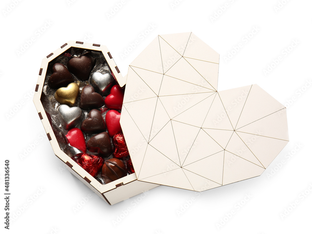 Heart shaped box with tasty chocolate candies isolated on white background