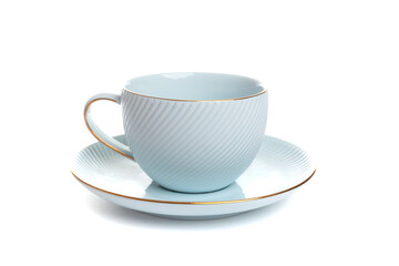 Blue cup for tea with a saucer on a white isolated background