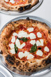 © Valery Rizzo - Margherita pizza with fresh mozzerella and basil on tray
