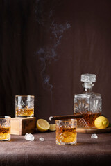 Wall Mural - glasses of rum with ice, lemon and cigar