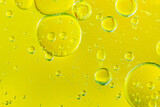 Fototapeta Łazienka - Yellow macro bubbles,Beautiful and fantastic macro photo of water droplets in oil with a yellow background
