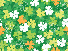 Seamless Vector Pattern Of Scattered Clovers And Shamrocks. This Repeating Pattern Is Perfect For A St Patricks Day Background Or Surface Design.