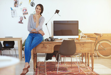 Poster - I meet every deadline. Portrait of a female designer in her office.