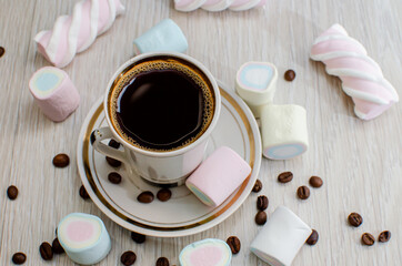 A cup of coffee and sweets