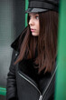 © alipko - Young fashion woman outdoor. Black hat and leather jacket
