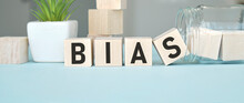 Bias - Word From Wooden Blocks With Letters, Personal Opinions Prejudice Bias Concept, Random Letters Around