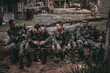 © reewungjunerr - Team of army soldier with machine gun moving in the forest,Thai militia soldier in combat uniforms in the wood,Wander the patrol sloping in the rainforest.