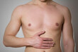 © Dima Plotnikov - Stomach pain. The man has a stomach ache