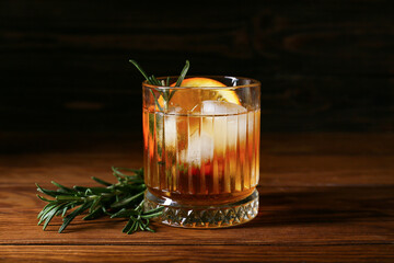 Glass of tasty Old Fashioned Cocktail on table