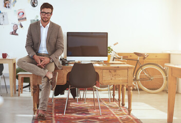 Poster - I'll get the job done. Portrait of a young male designer in his modern office.