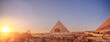 Banner Main tourist view famous wonder of world Sphinx and pyramids Giza, Egypt sunset sky