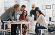 © BalanceFormCreative - Working day in a design studio. Group of designers and architects on meeting.Thay discuss about new project.