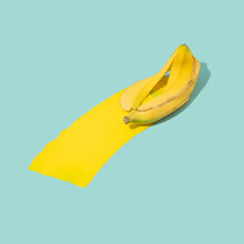 Slippery Banana Peel With A Trail Of Yellow Color Behind. Learning From Mistakes Minimal Concept.
