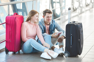 Young couple traveling. Man and woman going on a vacation.