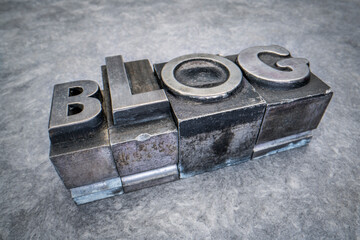 Canvas Print - blog word abstract in gritty vintage letterpress metal types against textured handmade paper, mixed 