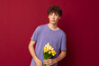 © Tatiana - kinky guy holding a yellow bouquet of flowers purple t-shirts Lifestyle unaltered