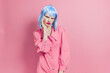 glamorous woman wears a blue wig makeup isolated background
