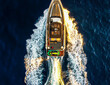 Drone shot of moving speed boat on the ocean