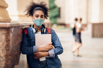 Wall Mural - African American Female Student Wearing Face Mask Standing Outdoors