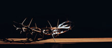 The Crown Of Thorns Of Jesus On  Black Background Against  Window Light With Copy Space, Can Be Used For Christian Background, Easter Concept