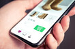 © terovesalainen - Website for retail shopping. Ecommerce fashion store mobile site. Product price and information online. Customer order and purchase clothes on internet with phone. Electronic add to cart button.