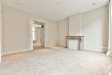 Empty Room With White Walls And Ceiling