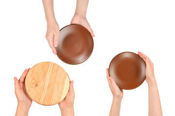 Empty plate in woman hands isolated on white background.