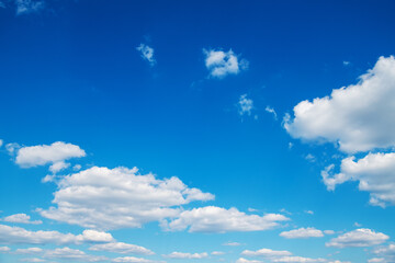 Wall Mural - White clouds in blue sky.