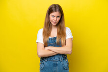 Young Caucasian Woman Isolated On Yellow Background With Unhappy Expression