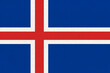 Icelandic national flag on textured background. Republic of Iceland