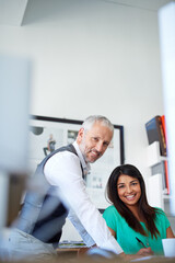 Aufkleber - They produce quality work. Cropped portrait of two designers in their office.