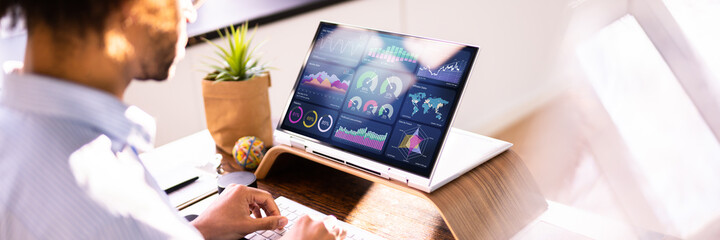 Aufkleber - African Businessman Using Analytics Data KPI Dashboard