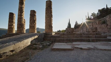 Wall Mural - Delphi - revealing the ruins of the temple of apollo at sunset