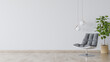 © Unreal image - Stanza vuota con poltrona e lampade di design