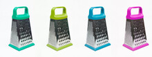 Colored Graters For Rubbing Products On A White Background. Cooking Concept. Vegetable Choppers