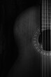 © m.zh - Acoustic guitar, detail. Music. close up. low-key photo. Black and white