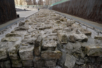 Wall Mural - Fragment of wall of White City on Khokhlovskaya Square, unique historical artifact, archeological monument of federal significance. Ruin of white stone about 50 m long and 4.5 m wide, Moscow, Russia