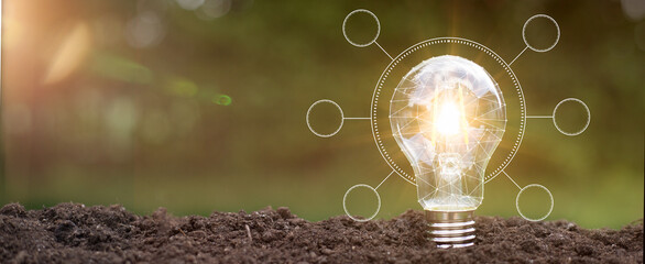 Green energy innovation light bulb with future industry of power generation icon graphic interface. Concept of sustainability development by alternative