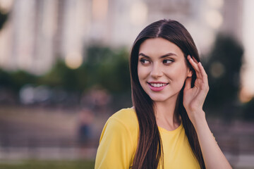 Sticker - Photo of pretty cheerful person arm touch hair look interested far have good mood spend pastime outside