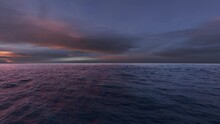 Sunset Ocean Background. Loop Motion Graphics. Waves.