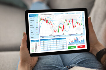 Aufkleber - Relaxed woman checking bitcoin price on digital tablet, closeup