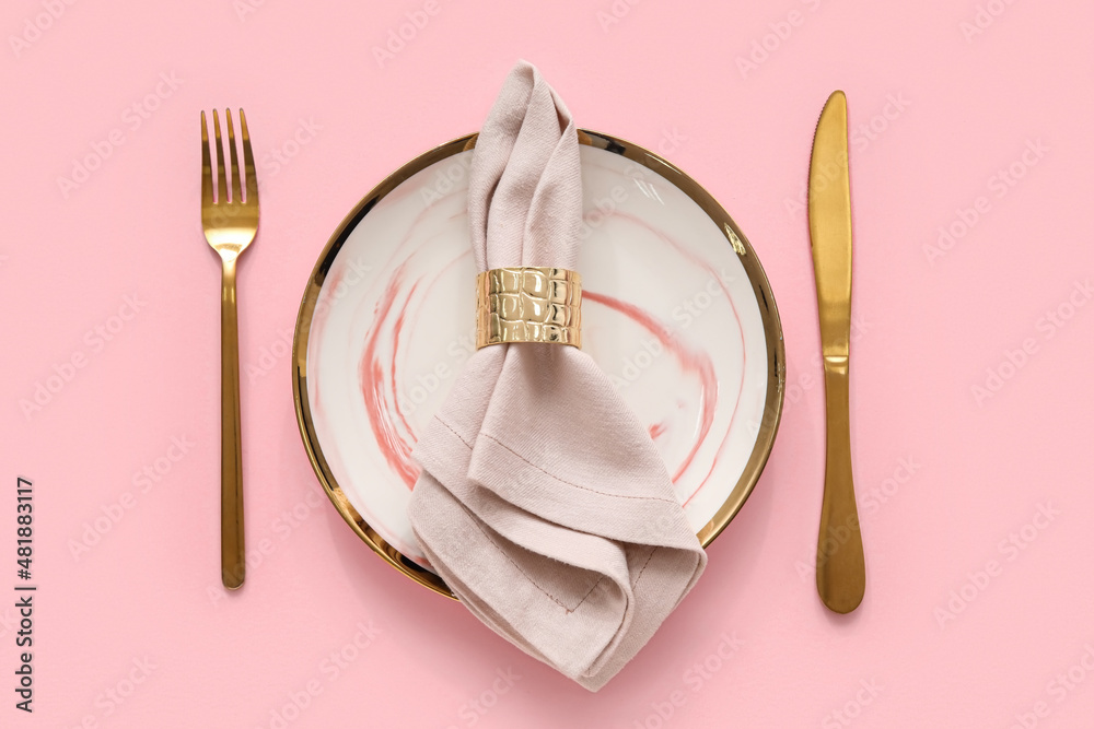 Stylish table setting on pink background