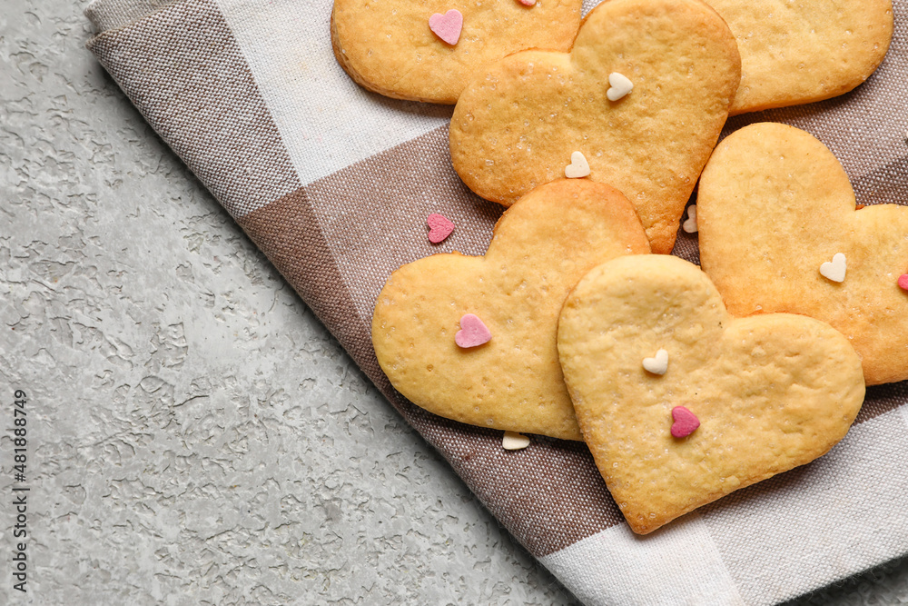 Tasty heart shaped cookies on grey background. Valentines Day celebration
