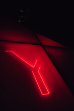 Abstract Neon Y Letter In Red And Black At Night