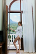 © SHOTPRIME STUDIO - Portrait of young beautiful woman in sexy lingerie posing on balcony Lifestyle
