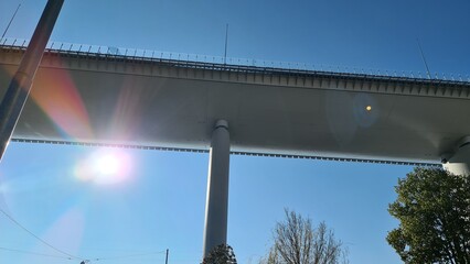 Genova, Italy- January 20, 2022: Beautiful viiew to the new bridge of Genova froom the bottom. Modern construction. Ponte San Giorgio with blue sky in the background.