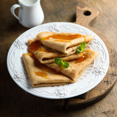 Wall Mural - Homemade crepes with apricot jam