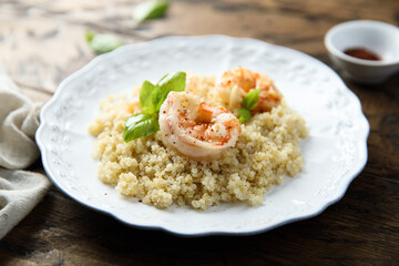 Wall Mural - Roasted shrimps with quinoa and basil