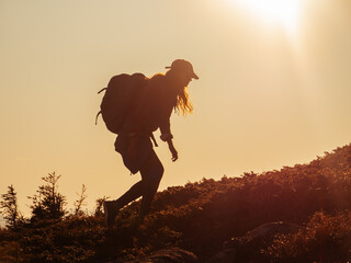 Hike travel Asian hiker woman carrying heavy backpack tired on outdoor trek in Grand Canyon trail walking up the mountain. Active healthy lifestyle.